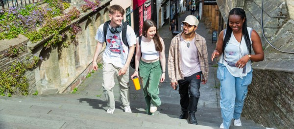 Students walking up steps